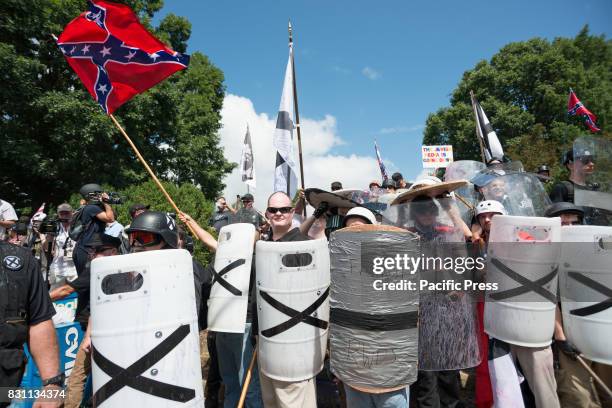 Neo-Nazis, white supremacists and other alt-right factions scuffled with counter-demonstrators near Emancipation Park in downtown Charlottesville,...