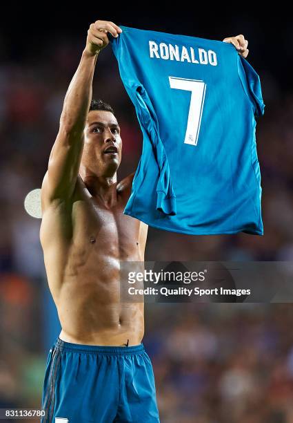 Cristiano Ronaldo of Real Madrid celebrates after scoring the second goal during the Supercopa de Espana Supercopa Final 1st Leg match between FC...