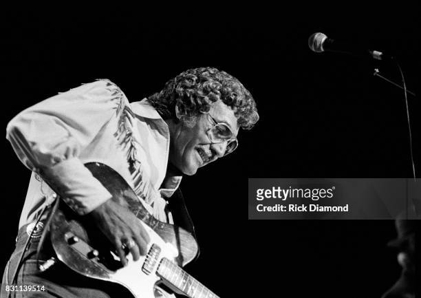 Rockabilly and country singer Carl Perkins performs on October 11, 1986 in Atlanta, Georgia.
