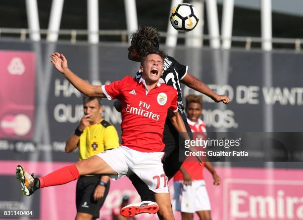 Benfica forward Nuno Santos from Portugal with CD Nacional midfielder Christian in action during the Segunda Liga match between SL Benfica B and CD...