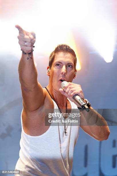 German singer Norman Langen performs at the SchlagerOlymp Open Air Festival at Freizeit und Erholungspark Luebars on August 12, 2017 in Berlin,...