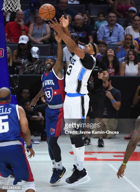 Mike James of Tri-State and Jerome Williams of Power go for a rebound during week eight of the BIG3 three on three basketball league at Staples...