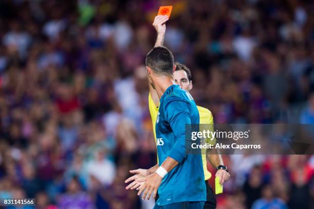Cristiano Ronaldo of Real Madrid CF reacts as he is shown a red card during the Supercopa de Espana Supercopa Final 1st Leg match between FC...