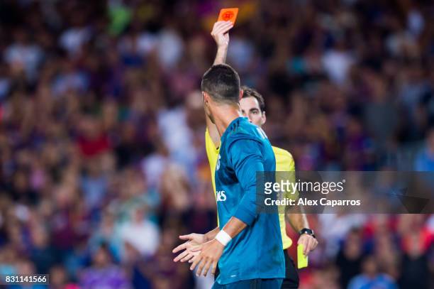 Cristiano Ronaldo of Real Madrid CF reacts as he is shown a red card during the Supercopa de Espana Supercopa Final 1st Leg match between FC...