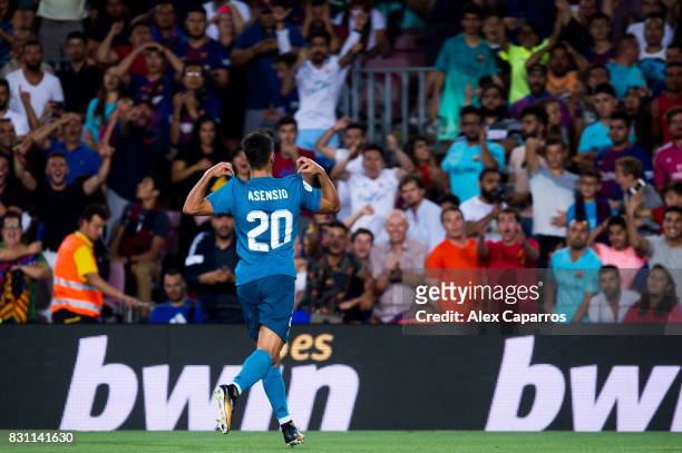 Marco Asensio of Real Madrid CF celebrates after scoring his team's third goal during the Supercopa de Espana Supercopa Final 1st Leg match between...