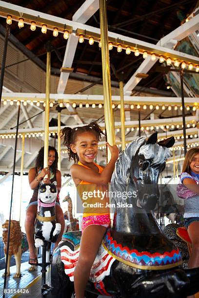 day at an amusement park - amusement park ride stockfoto's en -beelden