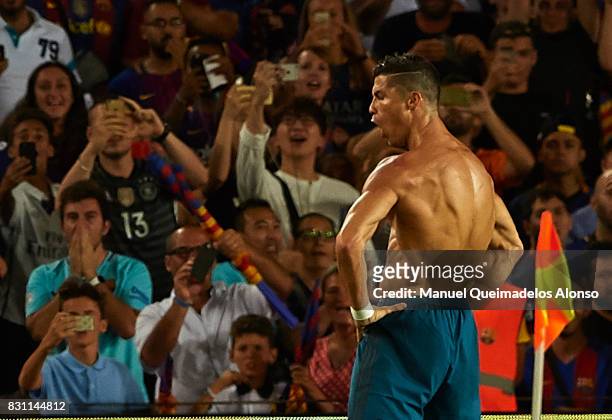 Cristiano Ronaldo of Real Madrid celebrates scoring his team's second goal during the Supercopa de Espana Supercopa Final 1st Leg match between FC...