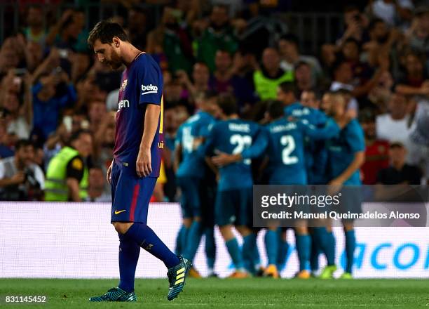 Lionel Messi of Barcelona reacts during the Supercopa de Espana Supercopa Final 1st Leg match between FC Barcelona and Real Madrid at Camp Nou on...