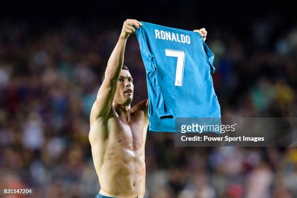 Cristiano Ronaldo of Real Madrid celebrating his score the second of Real Madrid shirtless during the Supercopa de Espana Final 1st Leg match between...