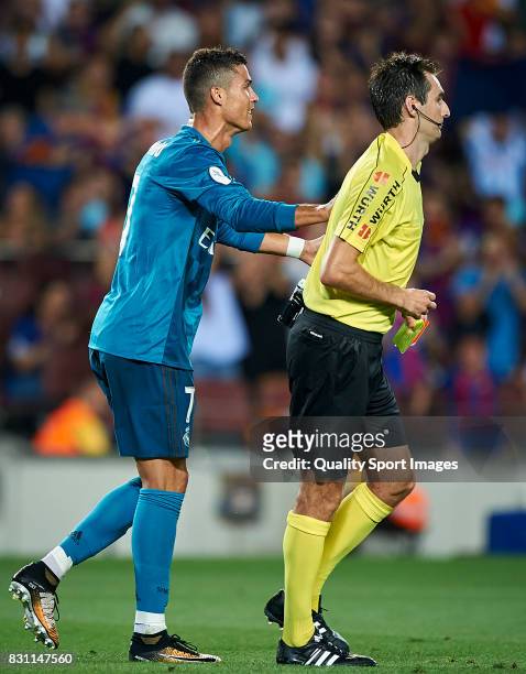 Cristiano Ronaldo of Real Madrid reacts after a red card during the Supercopa de Espana Supercopa Final 1st Leg match between FC Barcelona and Real...
