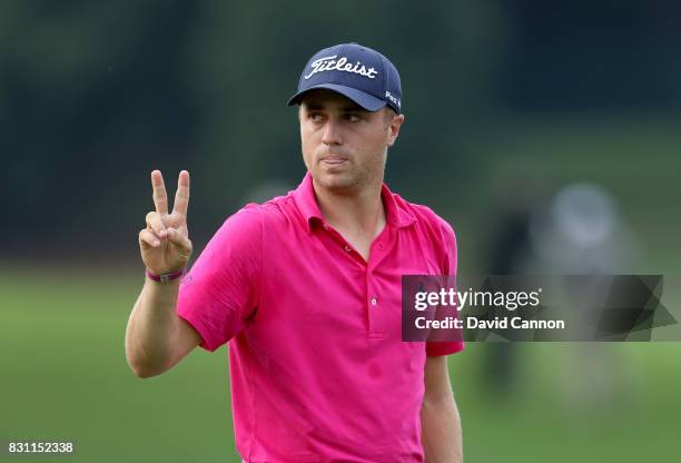 Justin Thomas of the United States makes a birdie two on the par 3, 17th hole during the final round of the 2017 PGA Championship at Quail Hollow on...