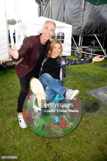 Julian David and Laura Wilde during the SchlagerOlymp Open Air Festival at Freizeit und Erholungspark Luebars on August 12, 2017 in Berlin, Germany.