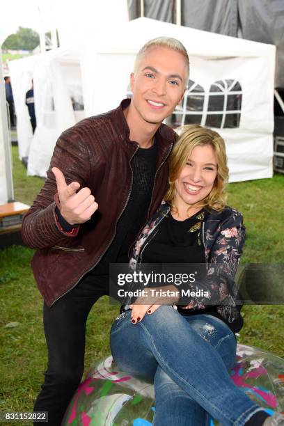 Julian David and Laura Wilde during the SchlagerOlymp Open Air Festival at Freizeit und Erholungspark Luebars on August 12, 2017 in Berlin, Germany.