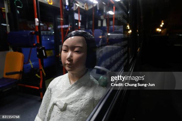 Comfort woman statue installed in a bus ahead of the 72nd Independence Day on August 14, 2017 in Seoul, South Korea. The statue was originally...