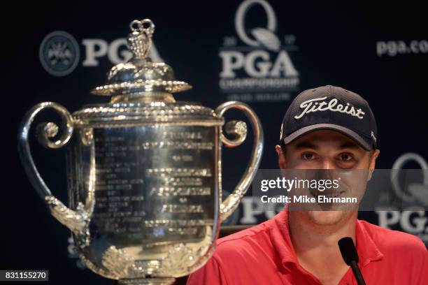 Justin Thomas of the United States speaks to the press with the Wanamaker Trophy after winning the 2017 PGA Championship during the final round at...