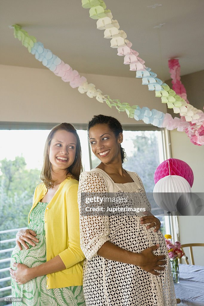 Smiling pregnant women