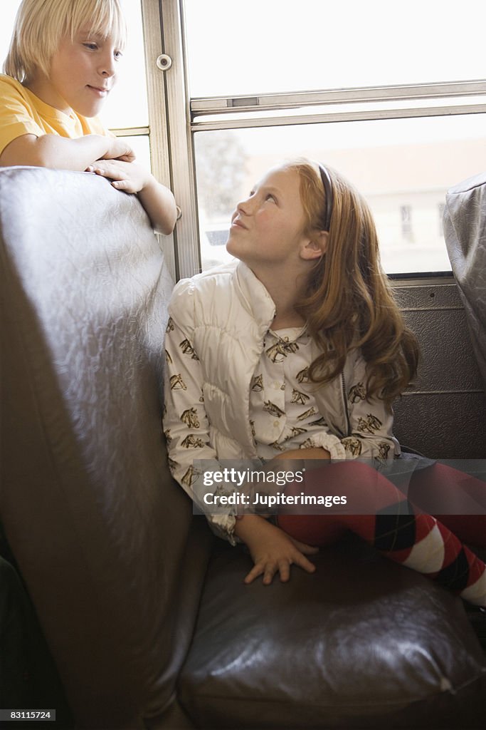 Kids Using Bus Smiling Children On Bus High-Res Stock Photo - Getty Images