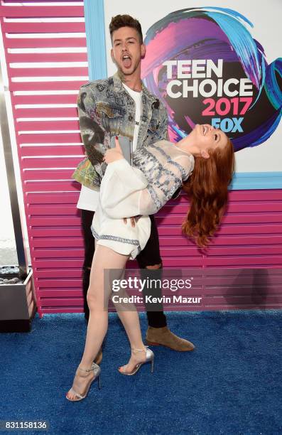 Travis Mills and Madelaine Petsch attend the Teen Choice Awards 2017 at Galen Center on August 13, 2017 in Los Angeles, California.