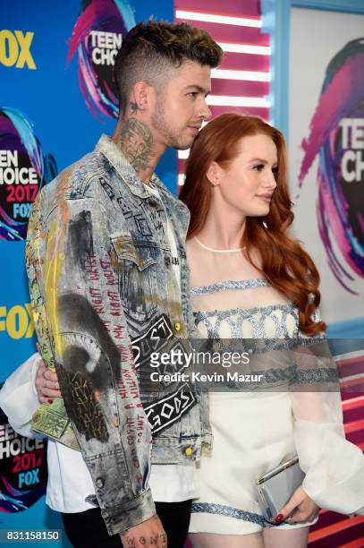 Travis Mills and Madelaine Petsch attend the Teen Choice Awards 2017 at Galen Center on August 13, 2017 in Los Angeles, California.