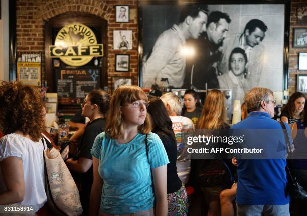 Fan is seen inside the cafe at Sun Studio where Elvis Presley made his first recordings, on August 13, 2017 in Memphis, Tennessee. Forty years after...