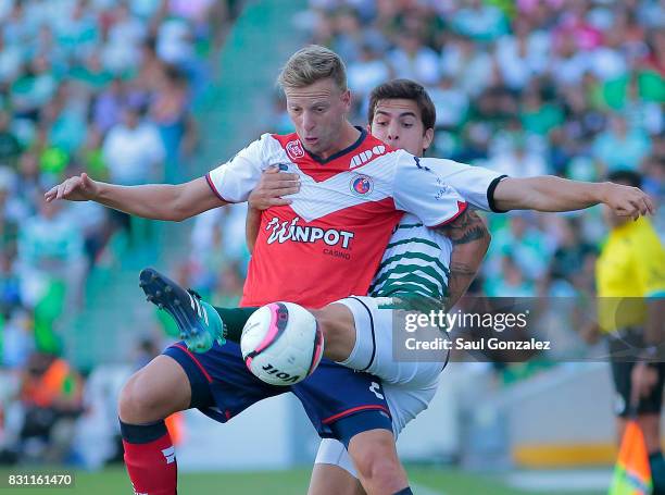 Cristian Menendez of Veracruz and Ulises Rivas of Santos fight for the ball during the 4th round match between Santos Laguna and Veracruz as part of...
