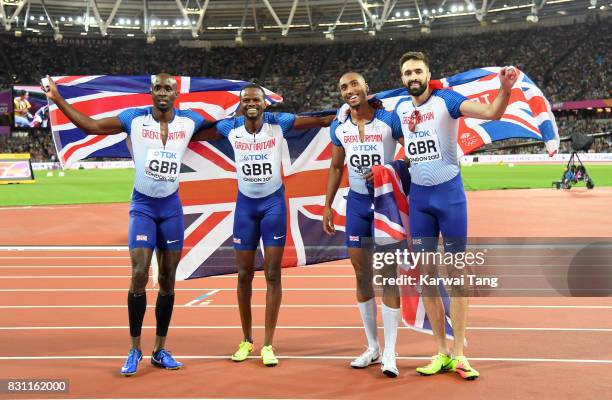 Matthew Hudson-Smith, Dwayne Cowan, Rabah Yousif and Martyn Rooney of Great Britain celebrate after winning bronze in the Men's 4x400 Metres Relay...