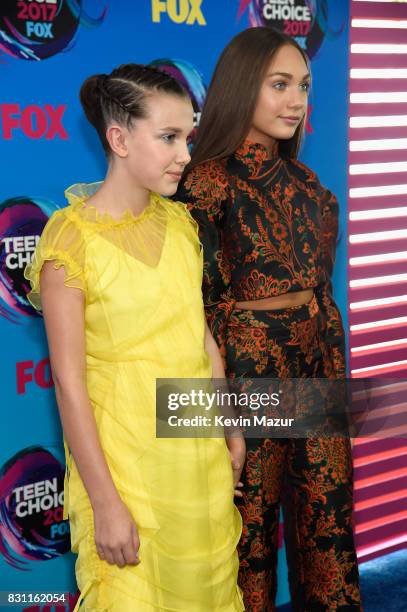 Millie Bobby Brown and Maddie Ziegler attend the Teen Choice Awards 2017 at Galen Center on August 13, 2017 in Los Angeles, California.