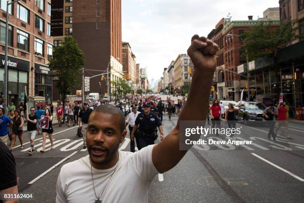 Protestors march through Midtown Manhattan as they rally against white supremacy and racism, August 13, 2017 in New York City. 32-year-old Heather...