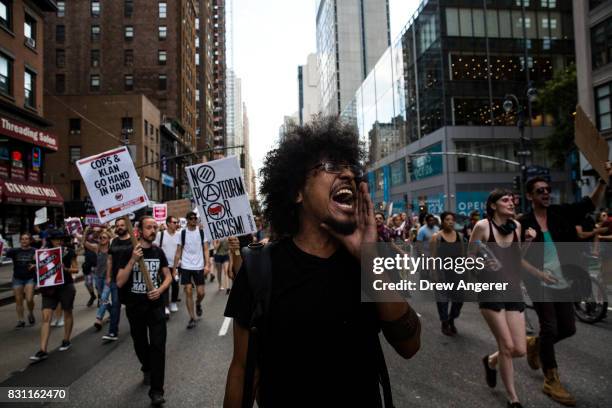 Protestors march through Midtown Manhattan as they rally against white supremacy and racism, August 13, 2017 in New York City. 32-year-old Heather...