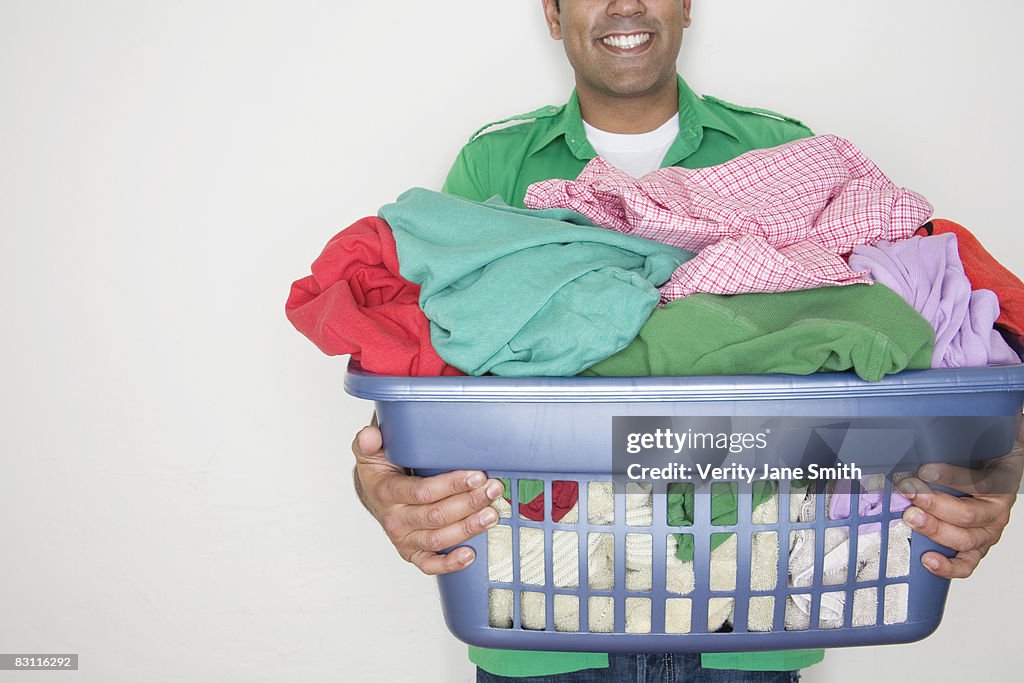 Man with laundry basket