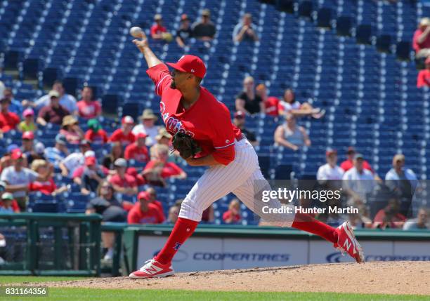 Jesen Therrien of the Philadelphia Phillies throws a pitch during a game against the Atlanta Braves at Citizens Bank Park on July 31, 2017 in...