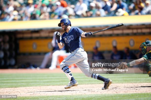 Trevor Plouffe of the Tampa Bay Rays bats during the game against the Oakland Athletics at the Oakland Alameda Coliseum on July 19, 2017 in Oakland,...
