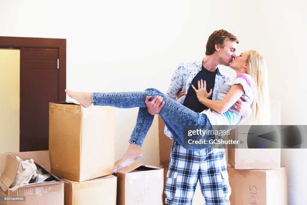 Newly weds celebrating their marriage, new home and love for each other