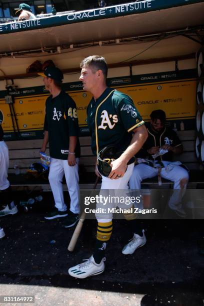 Jaycob Brugman of the Oakland Athletics stands in the dugout during the game against the Tampa Bay Rays at the Oakland Alameda Coliseum on July 19,...