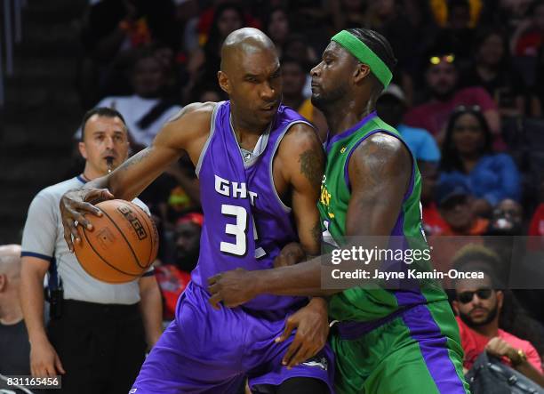 Kwame Brown of the 3 Headed Monsters guards Joe Smith of Ghost Ballers during the BIG3 game at Staples Center on August 13, 2017 in Los Angeles,...