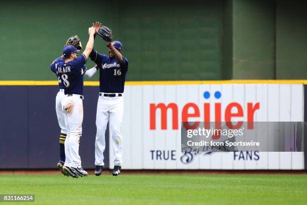 Milwaukee Brewers left fielder Ryan Braun Milwaukee Brewers right fielder Domingo Santana and Milwaukee Brewers center fielder Hernan Perez celebrate...