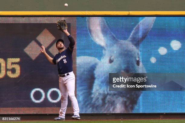 Milwaukee Brewers left fielder Ryan Braun makes a catch at the fence during a game between the Milwaukee Brewers and the Cincinnati Reds at Miller...