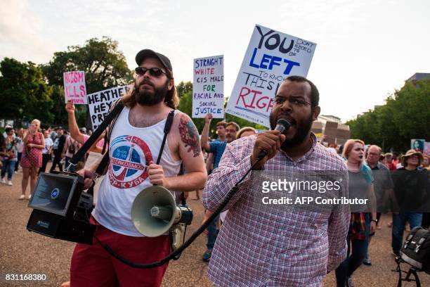 Eugene Puryear leads a march from the White House on August 13, 2017 in Washington, DC, to a statue of Confederate General Albert Pike, the only...