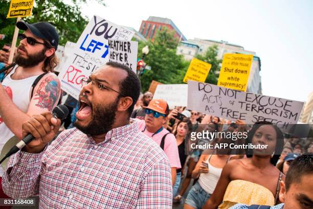 Eugene Puryear, leads a march from the White House on August 13, 2017 in Washington, DC, to a statue of Confederate General Albert Pike, the only...
