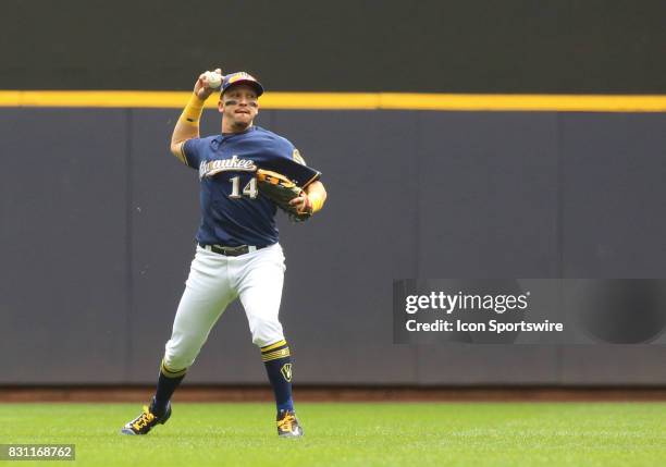 Milwaukee Brewers left fielder Hernan Perez throws back to the infield during a game between the Milwaukee Brewers and the Cincinnati Reds at Miller...