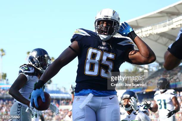 Antonio Gates of the Los Angeles Chargers celebrates after making a touchdown in the first quarter against the Seattle Seahawks at StubHub Center on...