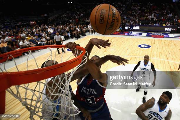 Rasual Butler of Power defends against Dominic McGuire of Tri State during week eight of the BIG3 three on three basketball league at Staples Center...