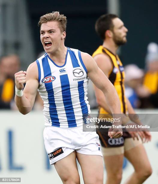 Cameron Zurhaar of the Kangaroos celebrates his first AFL goal during the 2017 AFL round 21 match between the Hawthorn Hawks and the North Melbourne...