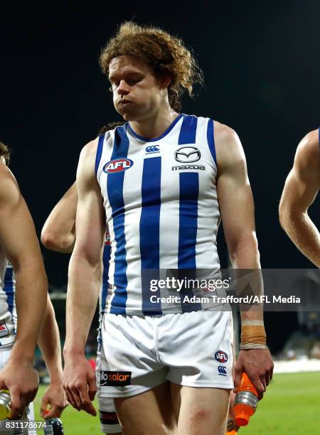 Ben Brown of the Kangaroos looks dejected after a loss during the 2017 AFL round 21 match between the Hawthorn Hawks and the North Melbourne...