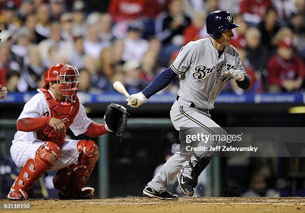 Craig Counsell of the Milwaukee Brewers bats in front of Carlos Ruiz of the Philadelphia Phillies in Game 2 of the NLDS Playoff at Citizens Bank...