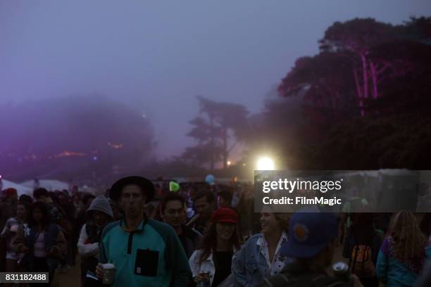 Festivalgoers walk to the Lands End Stage during the 2017 Outside Lands Music And Arts Festival at Golden Gate Park on August 13, 2017 in San...