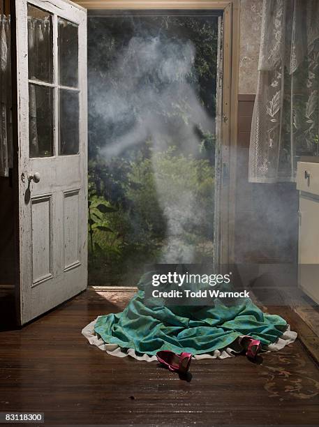 girl disappearing in puff of smoke - soul stories stock pictures, royalty-free photos & images