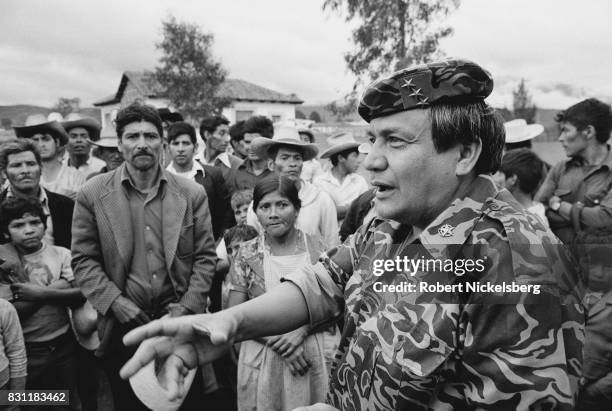 Guatemalan Army officer speaks to local residents about forming civil defense patrols to protect their village, near Huehuetenango, Guatemala, mid...