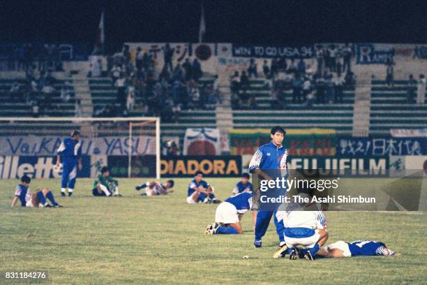 Japanese players show dejection after the 1994 FIFA World Cup Asian Final Qualifier match between Japan and Iraq at Al-Ahly Stadium on October 28,...