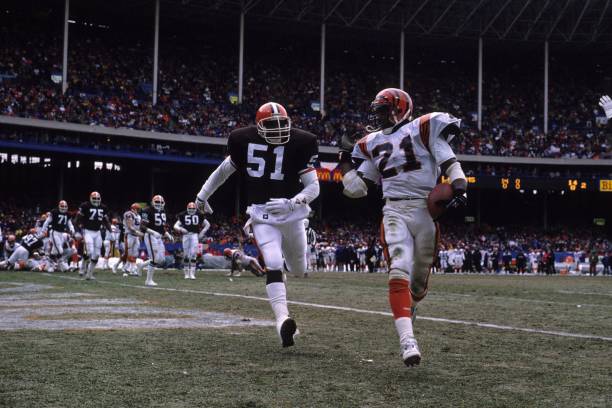 Runningback James Brooks of the Cincinnati Bengals taunts linebacker Eddie Johnson of the Cleveland Browns after a 1 yard touchdown run during a game...